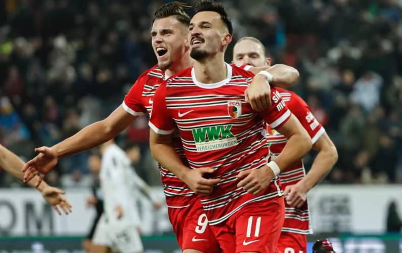 奥格斯堡客场逼平对手，继续保持不败之旅！(奥格斯堡队)